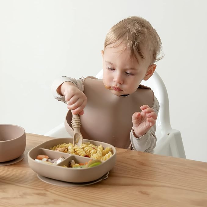SAMiGO Silicone Baby Utensils - Self Feeding Spoons and Tiny Training Cup - First Stage Baby Led Weaning Supplies for 6 Months+ Infants - Set of 4