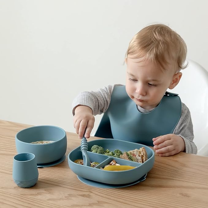 SAMiGO Silicone Baby Utensils - Self Feeding Spoons and Tiny Training Cup - First Stage Baby Led Weaning Supplies for 6 Months+ Infants - Set of 4