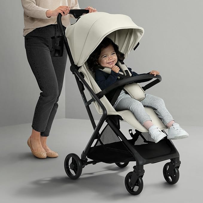 Delta Children Icon Ultra Compact Lightweight Everyday & Travel Stroller - One-Hand Fold - Only 15.6 Pounds - Fits in Overhead Compartments - Greenguard Gold Certified - Multi-Position Recline, Cream